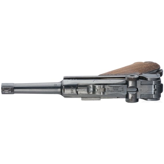 A Luger pistol by Erfurt, 1917, two matching magazines, with holster