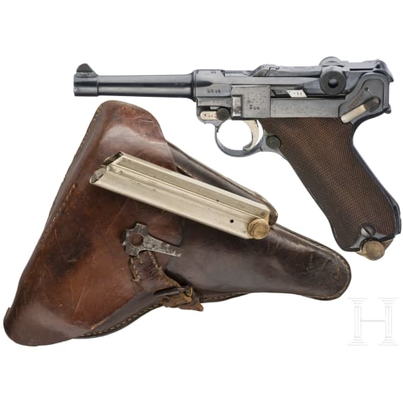 A Luger pistol by Erfurt, 1917, two matching magazines, with holster