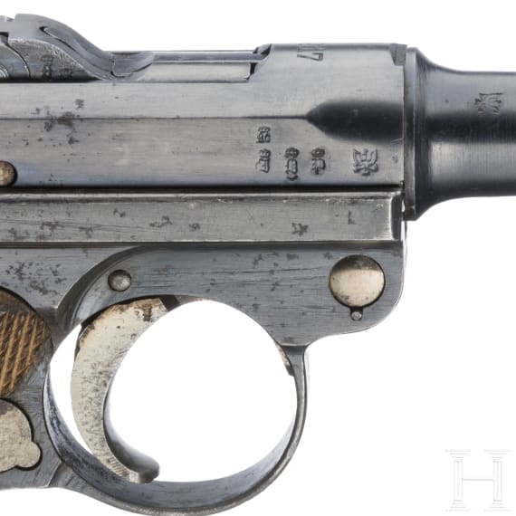 A Luger pistol by Erfurt, 1917, two matching magazines, with holster