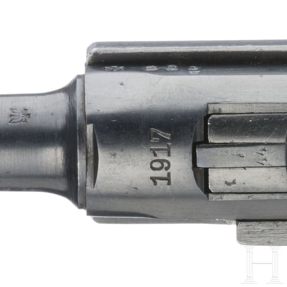 A Luger pistol by Erfurt, 1917, two matching magazines, with holster