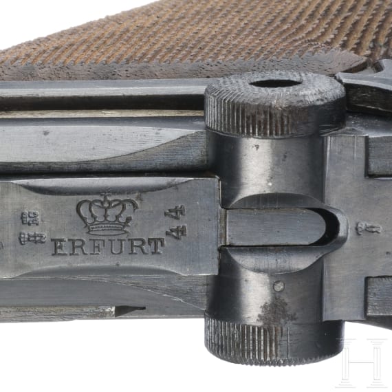 A Luger pistol by Erfurt, 1917, two matching magazines, with holster