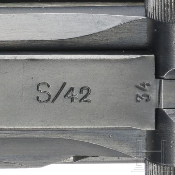 A Luger pistol by Mauser, code "G - S/42", with holster; Kriegsmarine