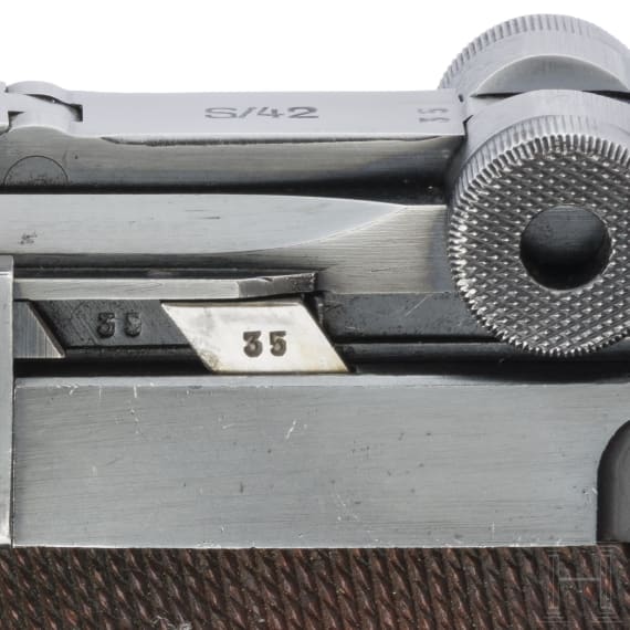 A Luger pistol by Mauser, code "1937 - S/42", with holster