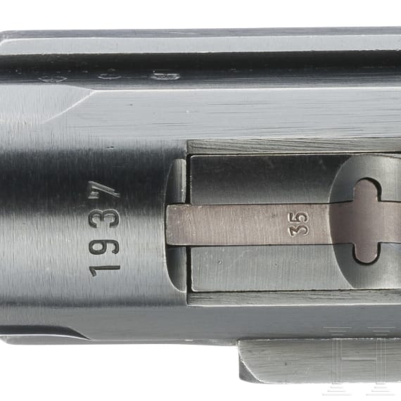 A Luger pistol by Mauser, code "1937 - S/42", with holster