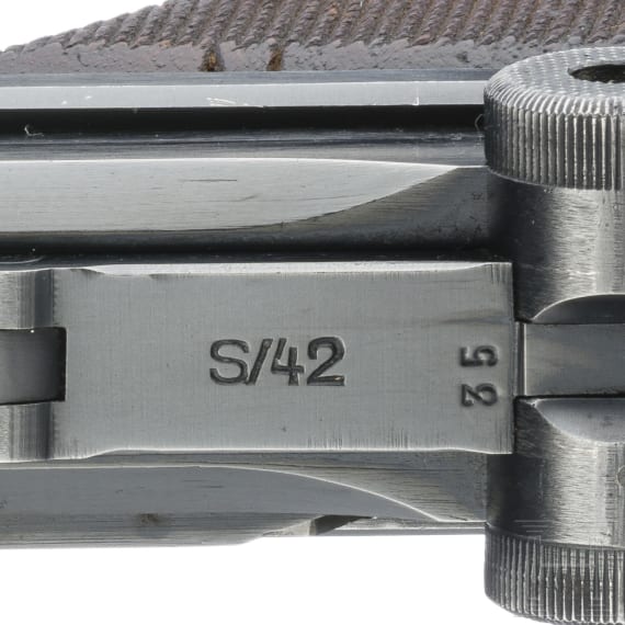 A Luger pistol by Mauser, code "1937 - S/42", with holster