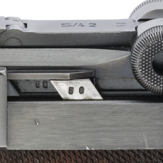 A Luger pistol by Mauser, code "1938 - S/42", with holster; Kriegsmarine