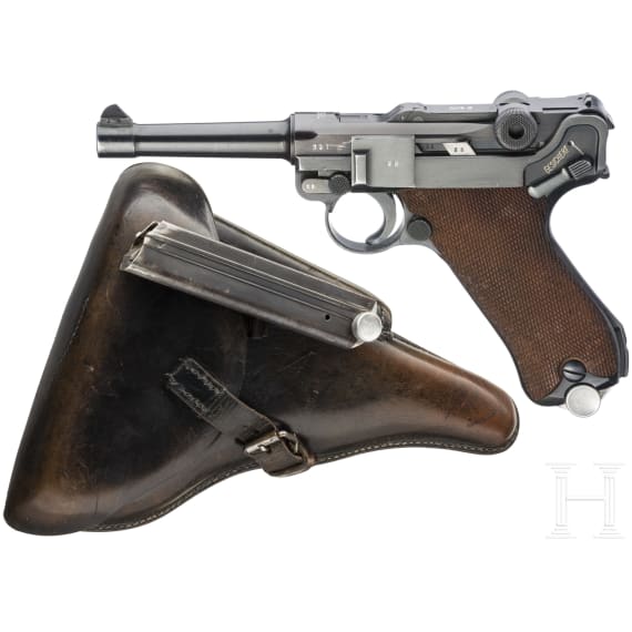 A Luger pistole by Mauser, code "1938 - S/42", 2 matching magazines, holster; Kriegsmarine