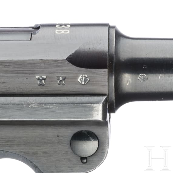 A Luger pistole by Mauser, code "1938 - S/42", 2 matching magazines, holster; Kriegsmarine