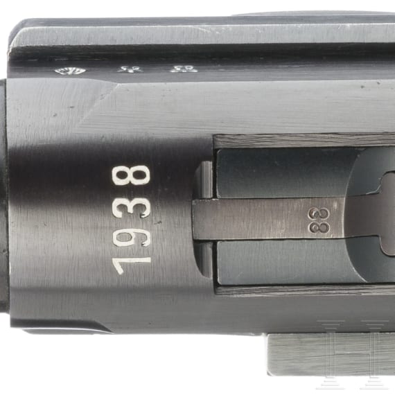 A Luger pistole by Mauser, code "1938 - S/42", 2 matching magazines, holster; Kriegsmarine