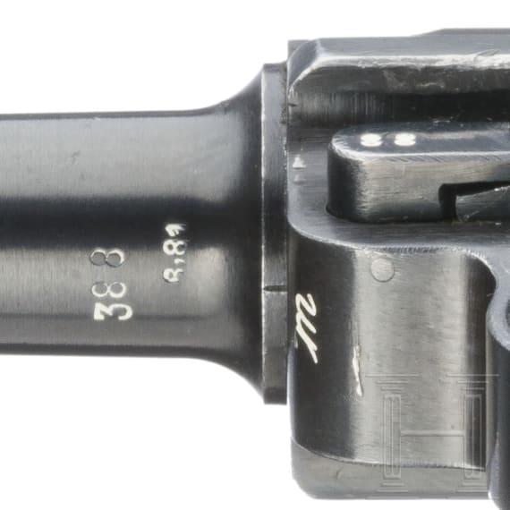A Luger pistole by Mauser, code "1938 - S/42", 2 matching magazines, holster; Kriegsmarine