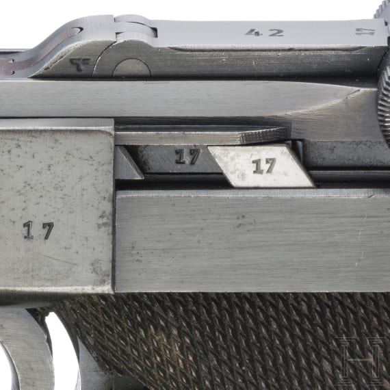 A Luger pistol by Mauser, code "1939 - 42", with holster
