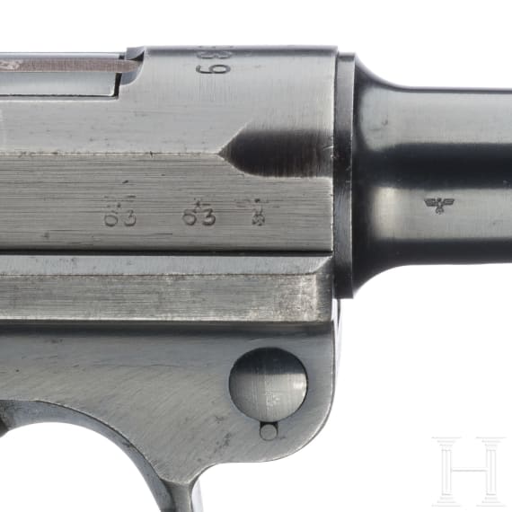 A Luger pistol by Mauser, code "1939 - 42", with holster