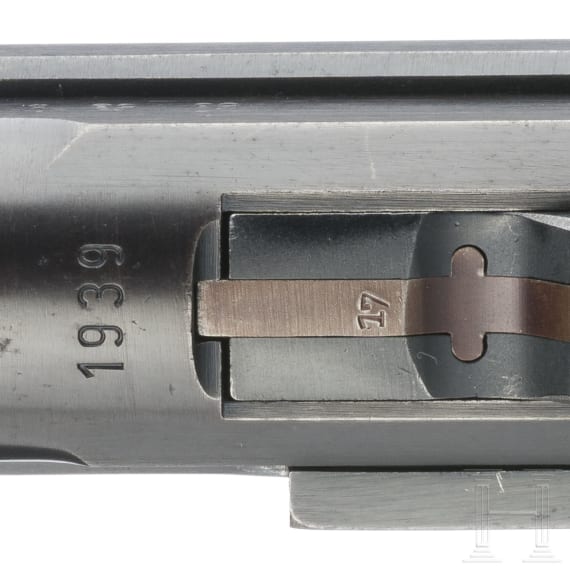 A Luger pistol by Mauser, code "1939 - 42", with holster