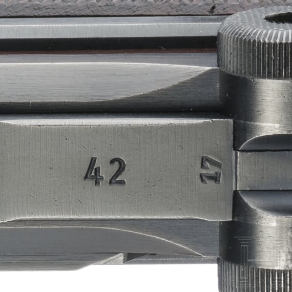 A Luger pistol by Mauser, code "1939 - 42", with holster