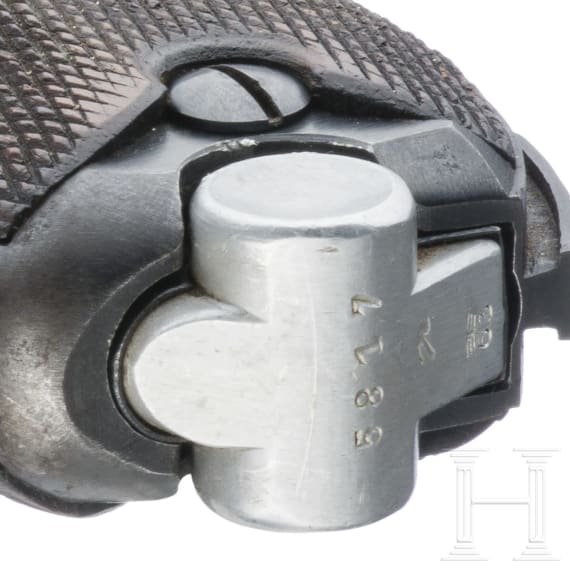 A Luger pistol by Mauser, code "1939 - 42", with holster