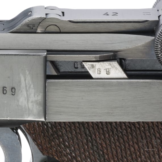 A Luger pistol by Mauser, code "1940 - 42", with holster, Kriegsmarine