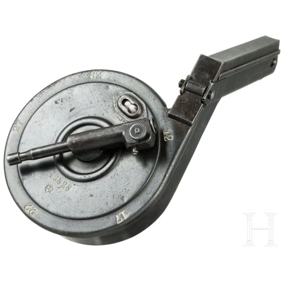 A snail drum magazine, fist pattern, for a Luger pistol, by AEG Berlin