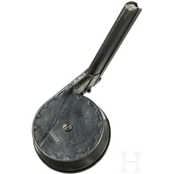 A snail drum magazine, fist pattern, for a Luger pistol, by AEG Berlin