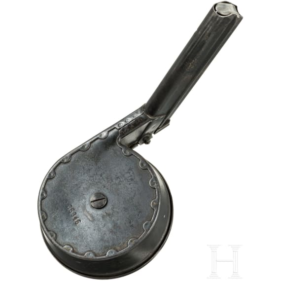 A snail drum magazine, first pattern, for a Luger pistol, by AEG in Berlin
