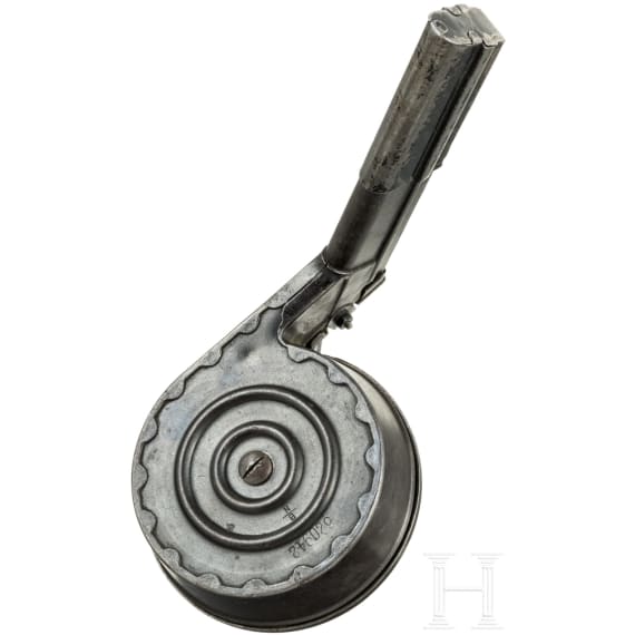 A snail drum magazine, first pattern, for a Luger pistol, by Bing in Nuremberg, with dust cover
