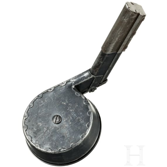A snail drum magazine, new pattern, for a Luger pistol, by Bing in Nuremberg, with dust cover