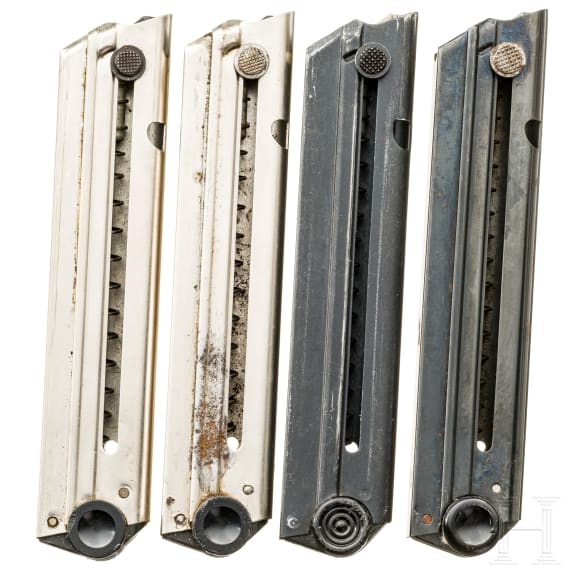 Four Luger magazines (reproductions)