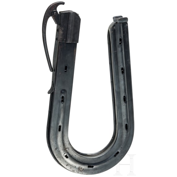 A "horseshoe" magazine for a French Union pistol in 7,65mm Browning