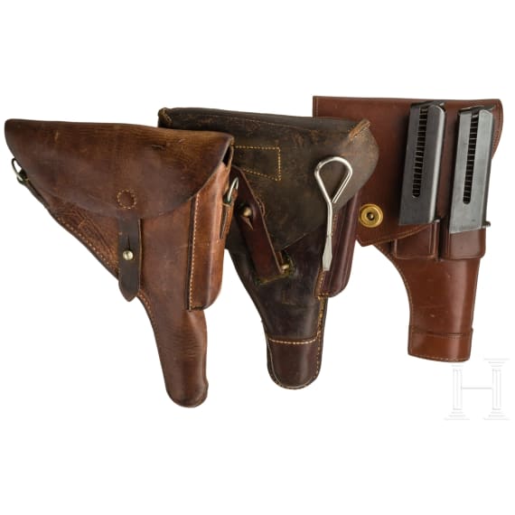 Three handgun holsters