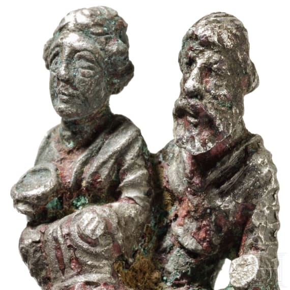 A Parthian silver pin head with a couple, 250 - 300 A.D.