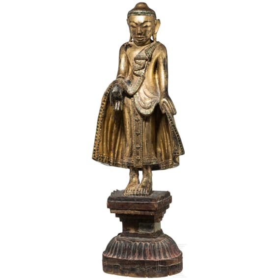 A Burmese sculpture of a standing Buddha, circa 1900