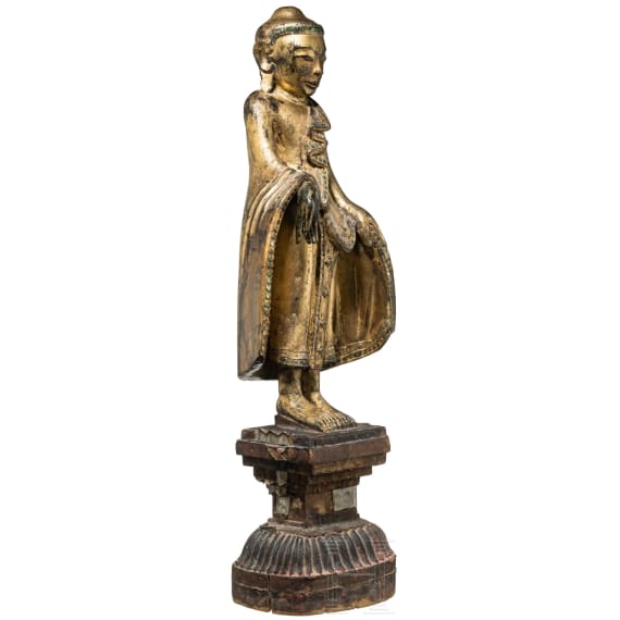 A Burmese sculpture of a standing Buddha, circa 1900