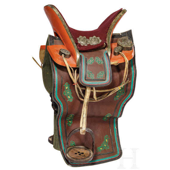A richly decorated Sino-Tibetan saddle, 20th century