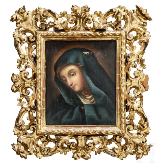 A probably German portrait of the Virgin Mary in a carved frame, 19th century