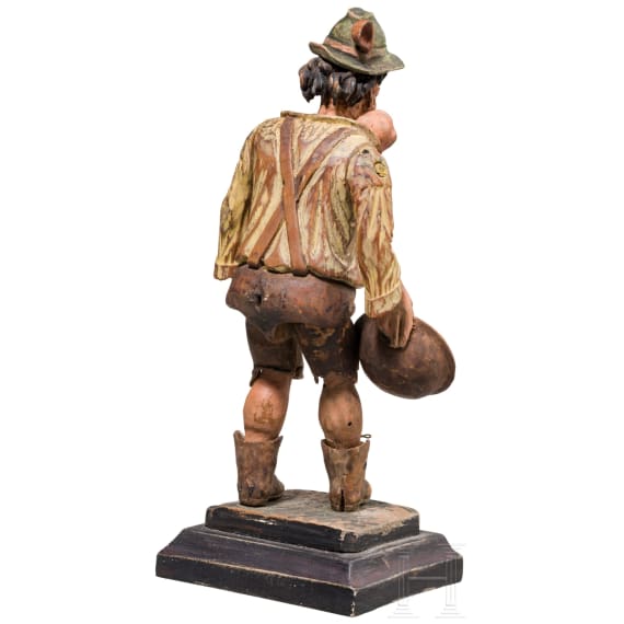 A German movable figurine of a beggar, circa 1800