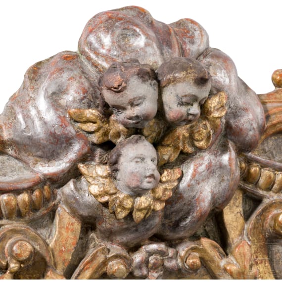 A fine South German Baroque mirror with carved frame, circa 1700