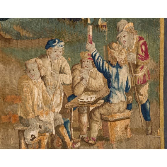 A large Flemish tapestry depicting a genre scene with bowling players, 17th century