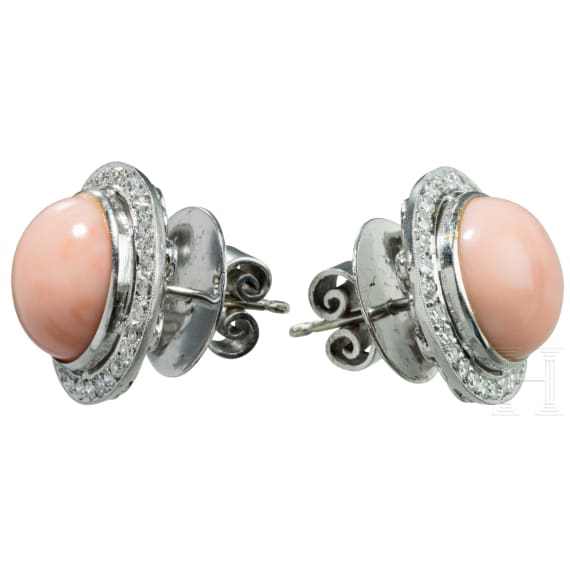 A pair of gold angel-skin coral earrings set with diamonds