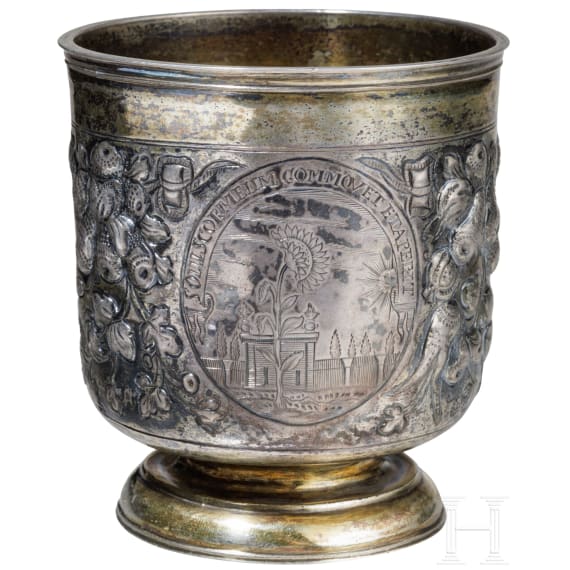 A partially gilt Russian silver pedestal beaker, Moscow, Michail Maximow Kluchin, 1738