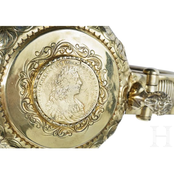 A large Russian silver-gilt lid tankard with coin of Peter II, Moscow, Grigory Ivanov Serebryanikov (Master 1745 - 1768), circa 1750