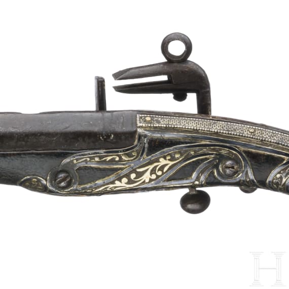A Caucasian silver-mounted miquelet pistol, mid-19th century
