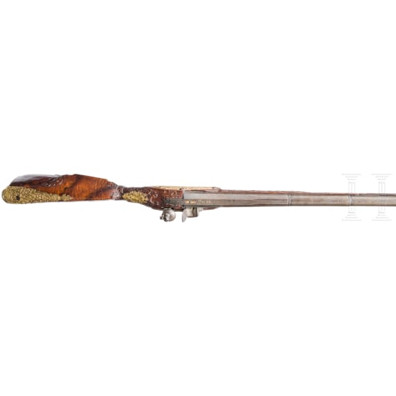 A lavishly carved, deluxe flintlock shotgun, Karlovy Vary(?), 18th century