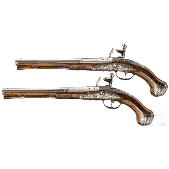 A pair of silver-mounted flintlock pistols, Niquet Lejeune, Liège, circa 1730/40
