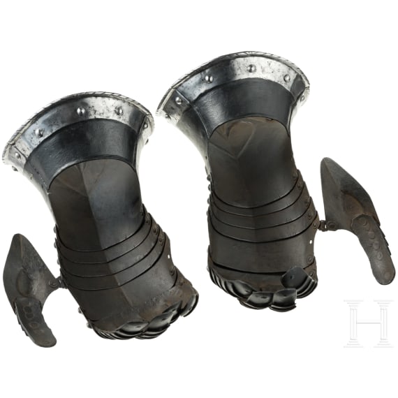 A pair of German black and white gauntlets, circa 1580