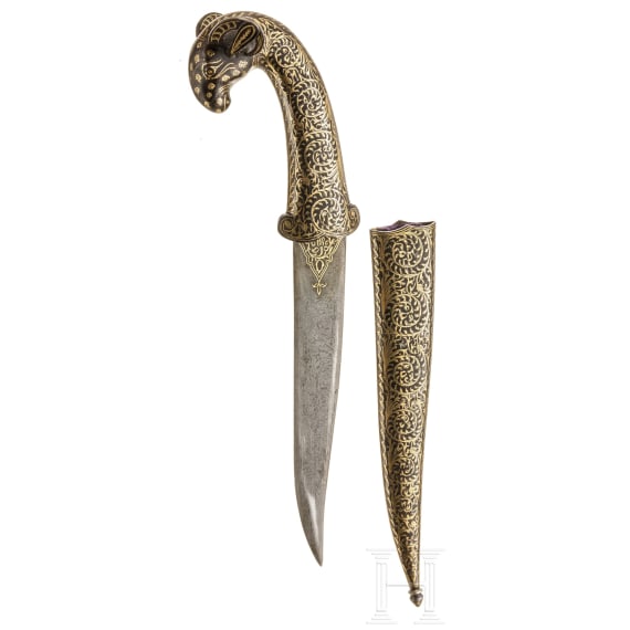 A gold-damascened Indian khanjar with ram's head handle, 20th century