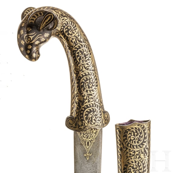 A gold-damascened Indian khanjar with ram's head handle, 20th century
