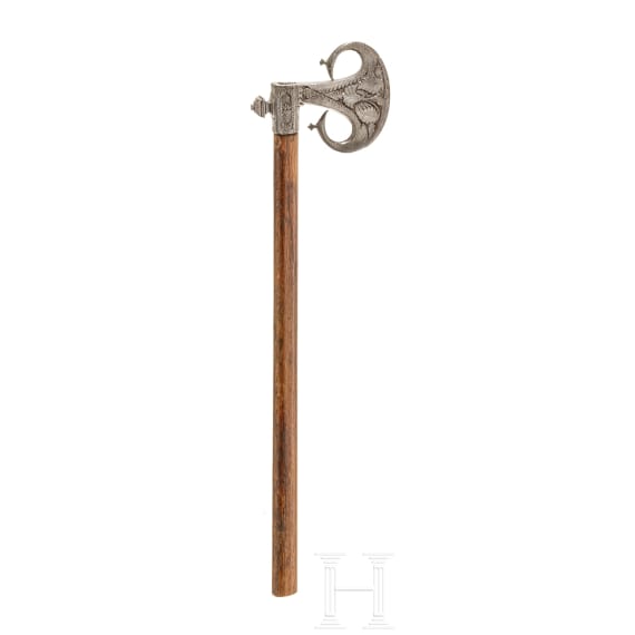 An Indian iron carved battle axe, 18th century