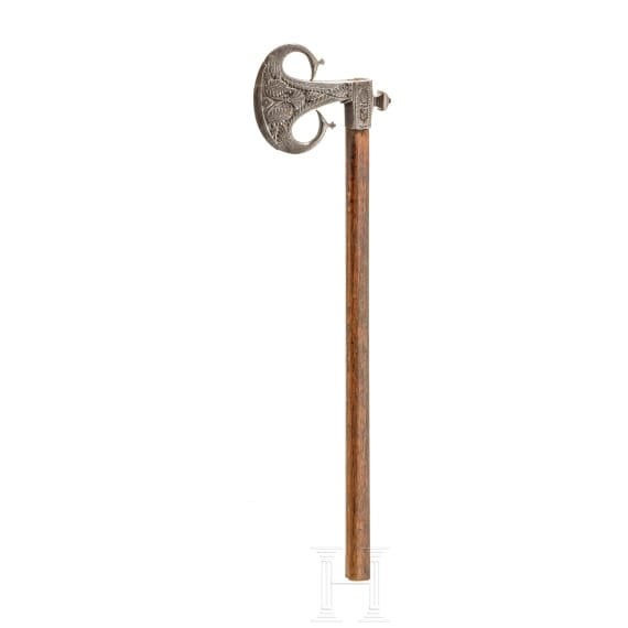 An Indian iron carved battle axe, 18th century