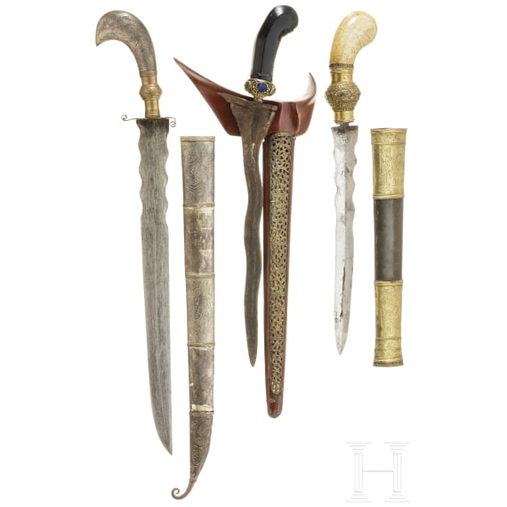 An Indonesian kris and two parangs, circa 1900