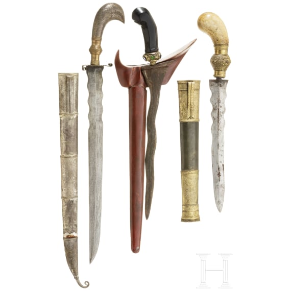 An Indonesian kris and two parangs, circa 1900