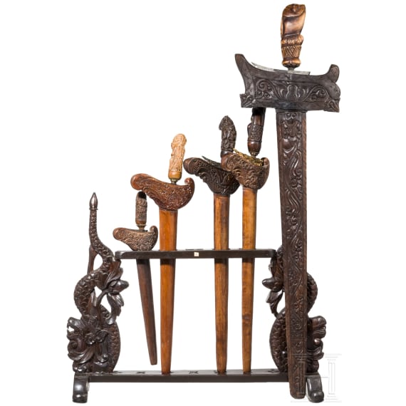 Five Indonesian kerises and a stand, 20th century
